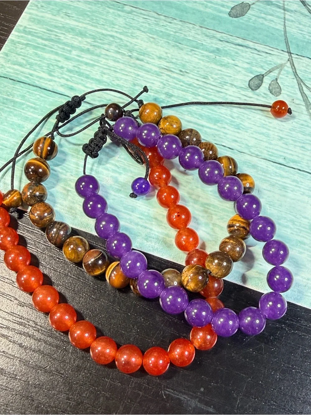3 GENUINE GEMSTONE BRACELETS, carnelian amethyst tigers eye